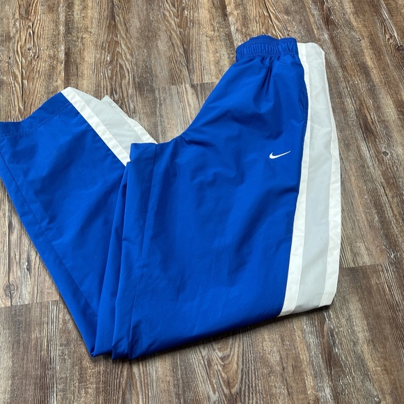 Vintage Nike blue and white snap off track pants